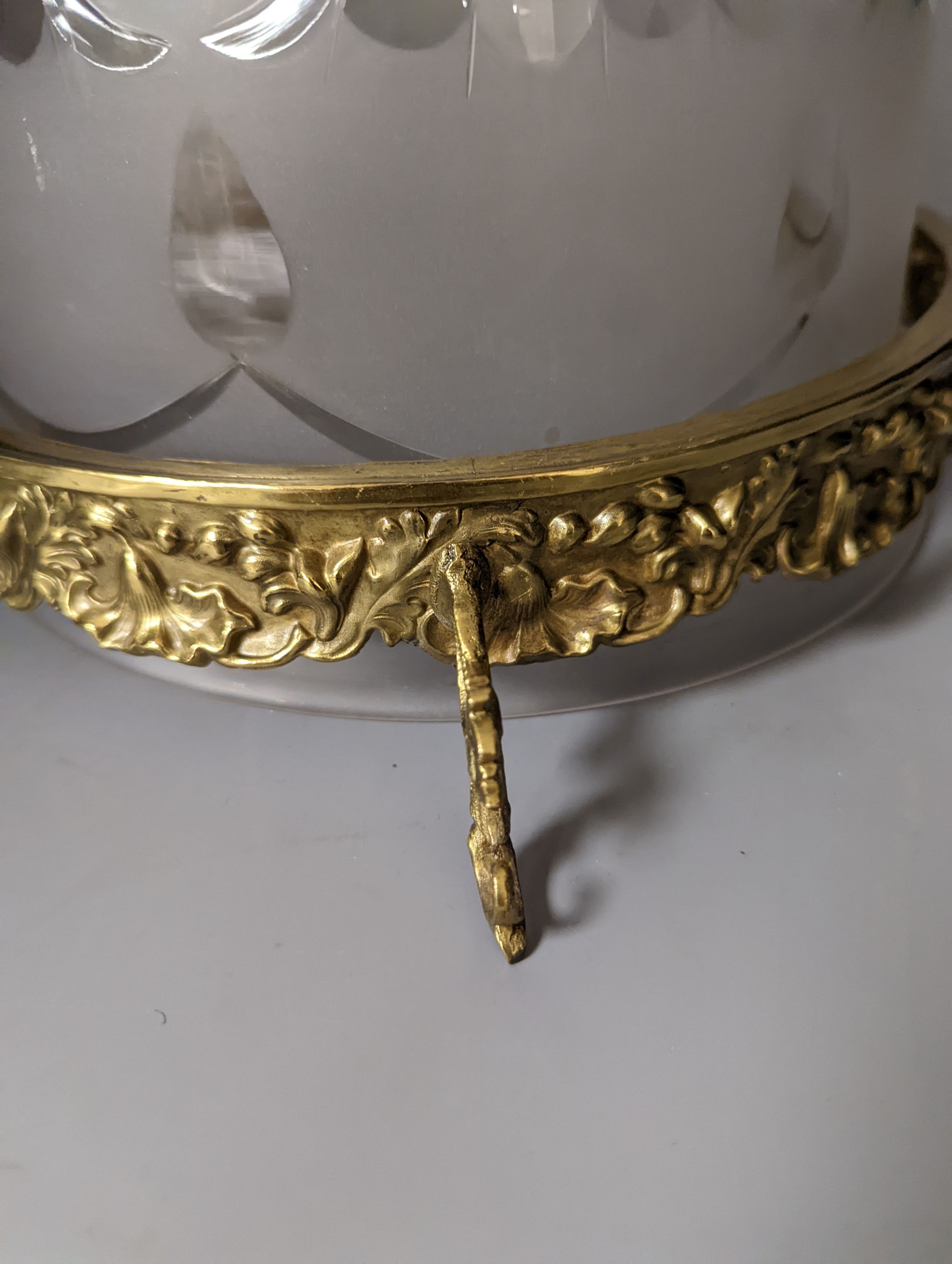 An overlaid etched glass and brass hanging light, 36 cms high, not including chain.